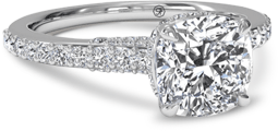 Cushion cut engagement ring with pave setting