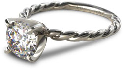 solitaire engagement ring with twisted cable band