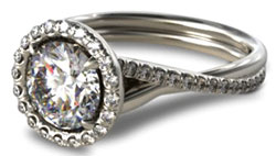 halo engagement ring with twisted pave shank