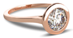 Rose gold bezel set diamond engagement ring