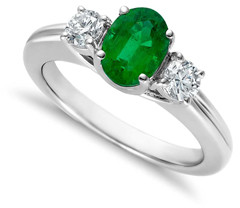 emerald engagement ring with diamond side stones e1431500582614