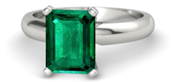 solitiare emerald cut emerald platinum ring