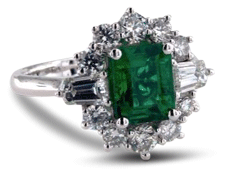 Halo emerald engagement ring with baguette side stones 2 e1434342681711