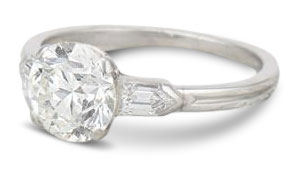 old english cut diamond engagement ring with bullet shaped side stones