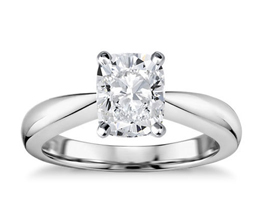 Classic tapered cushion cut diamond solitaire engagement ring