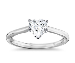 Petit heart shaped solitaire engagement ring