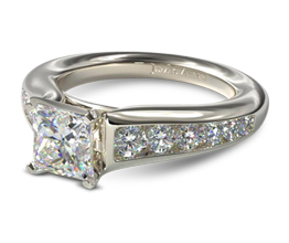 Graduated channel set princess cut diamond engagement ring