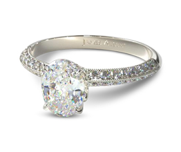 Knife edge pavé oval diamond engagement ring