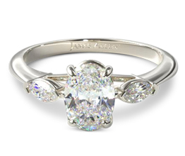 Three stone oval diamond ring with marquise side stones