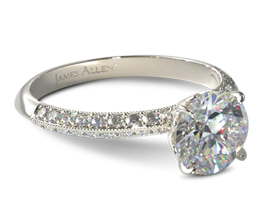 Knife edge two row pavé round diamond engagement ring