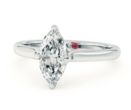 Four claw solitaire marquise diamond engagement ring