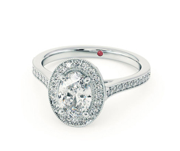 Talisman’ Oval diamond centre and bead-set diamond halo engagement ring