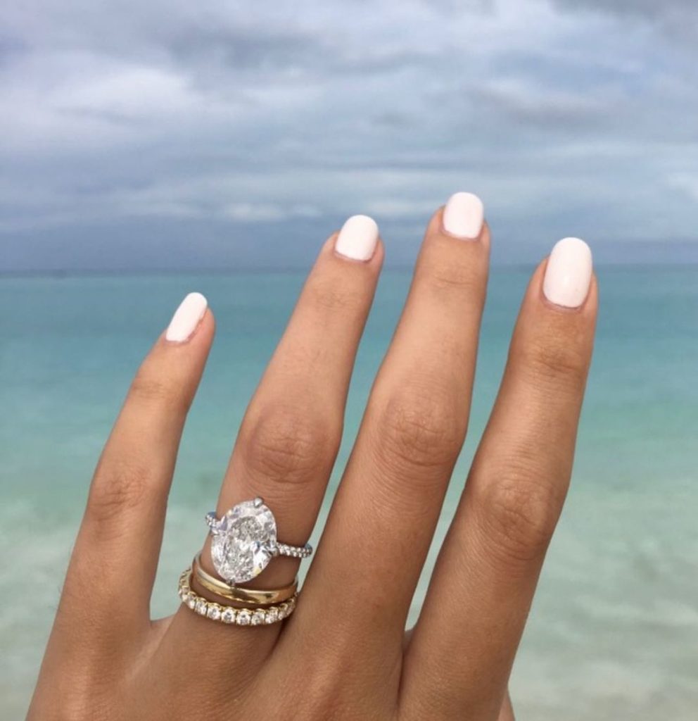 7ct Oval Diamond Ring with Half Moon Side Diamonds and Pave Diamond Band