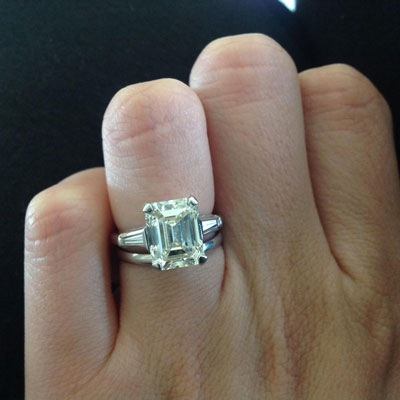 4 carat three stone emerald cut ring with baguette side stones