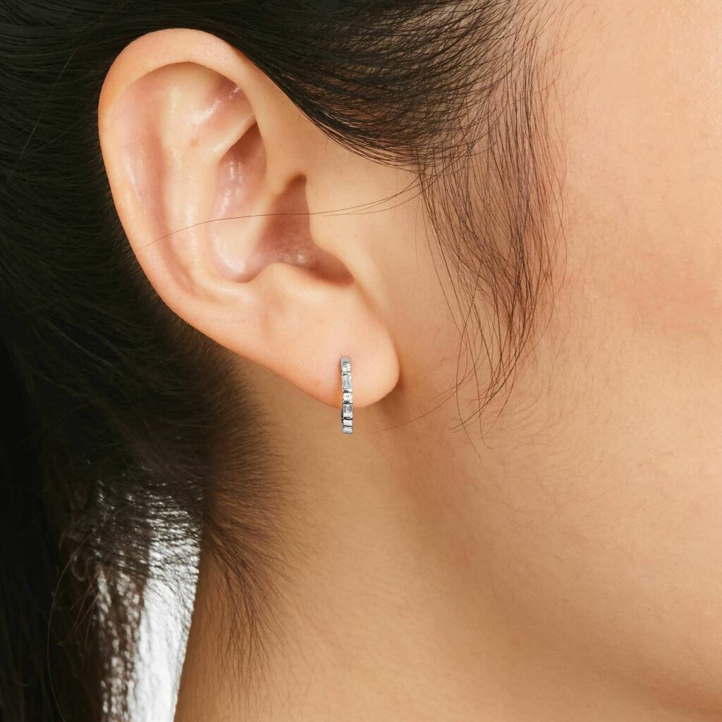 K White Gold Baguette Huggie Hoop Earrings on ear