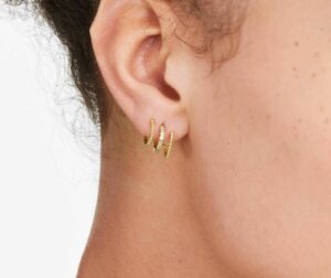 K Yellow Gold Bead And Diamond Three In One Huggie Earring By Brevani on ear