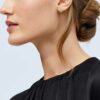 Diamond Huggie Hoop Earrings on ear
