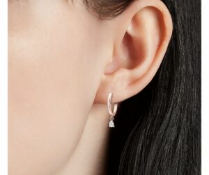 Diamond Pear Huggie Hoop Earrings in k Rose Gold on ear