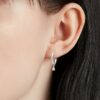 Diamond Pear Huggie Hoop Earrings in k White Gold on ear