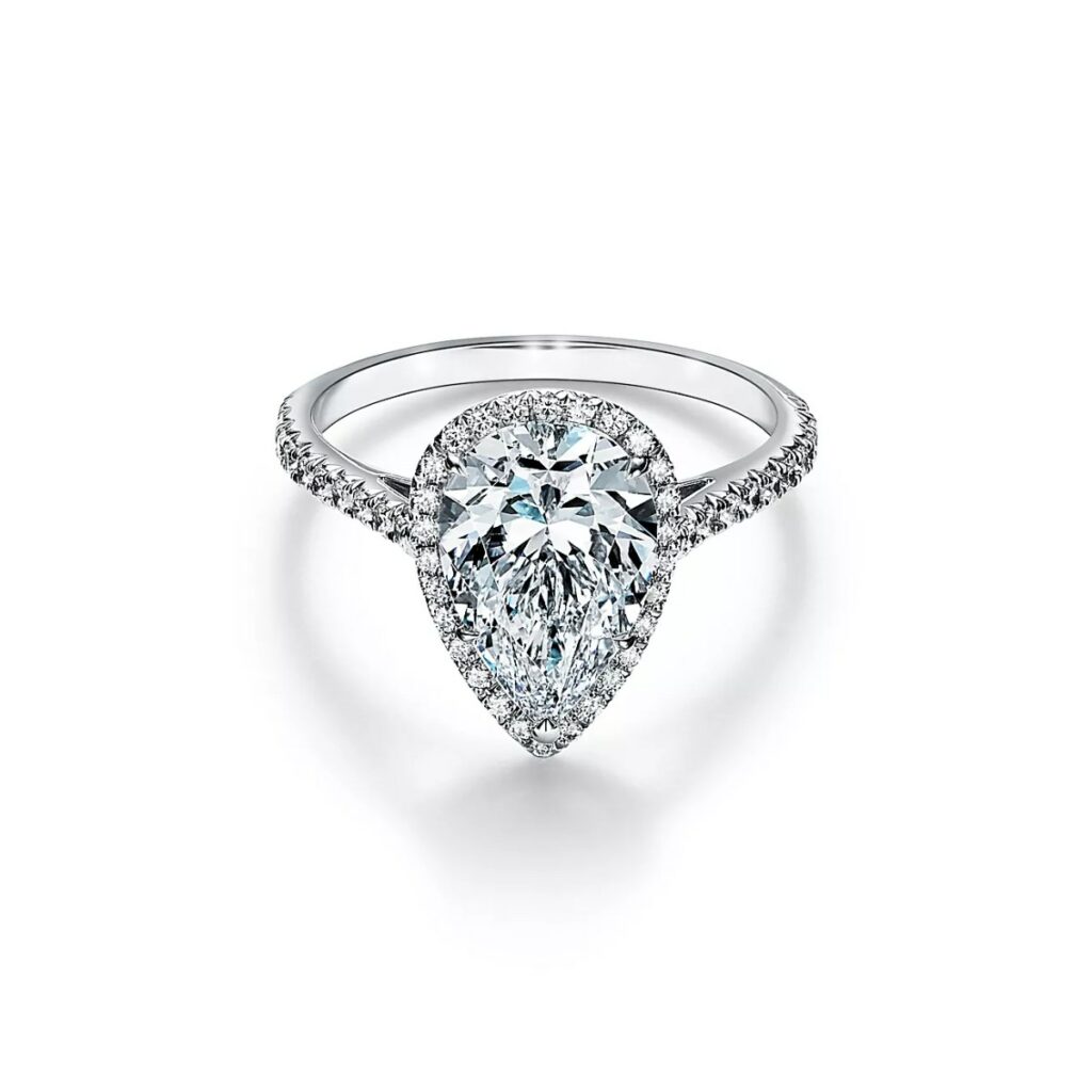 tiffany soleste pear shaped halo engagement ring with a diamond platinum band